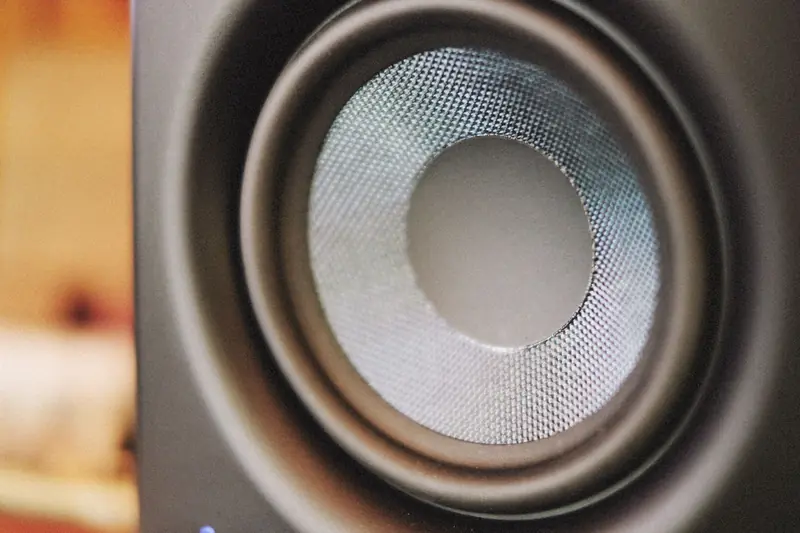 Detailed image of a modern speaker cone, highlighting audio technology and sound dynamics